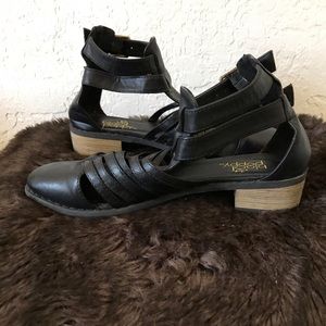 Black gladiator ankle boots